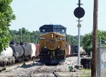 CSX 308 outside the yard office with a southbound train